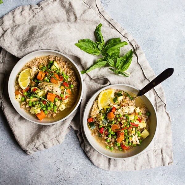 This lemon chicken vegetable farro soup is a great addition to your springtime menu. It's packed full of vegetables, bright lemon flavor and made even easier by using a rotisserieย chicken. You're going to love this fast and easy soup!ย