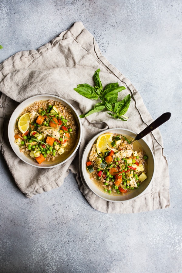 Lemon Chicken Vegetable Farro Soup served in 2 bowls.
