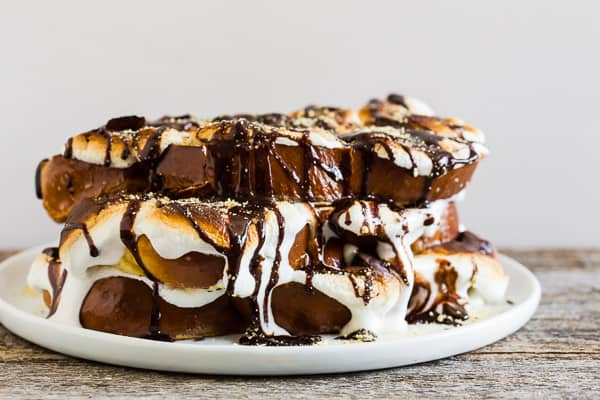 s'more french toast stacked on a white plate.