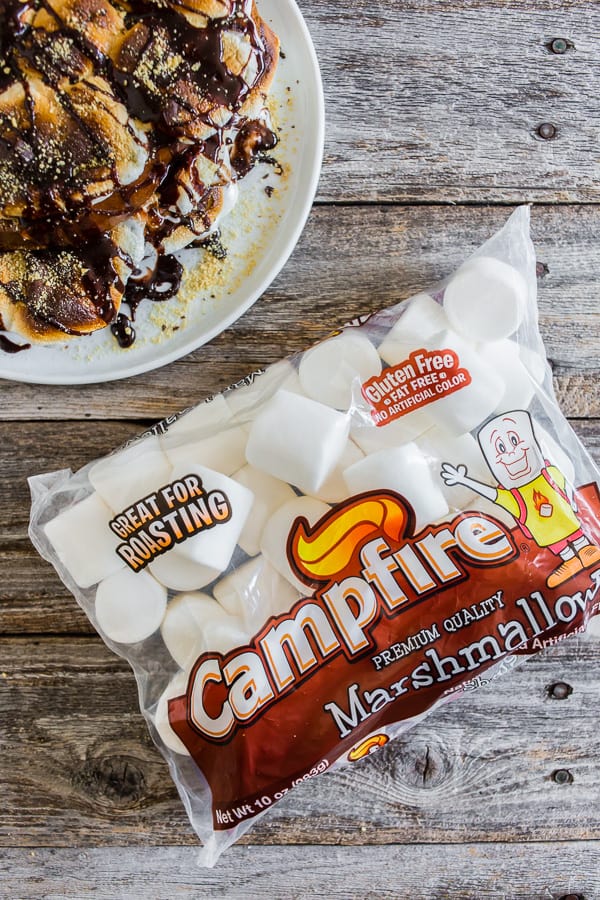 s'more french toast on a plate next to a bag of marshmallows.
