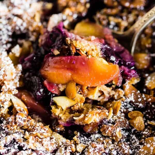 This blueberry peach cast iron crisp takes the flavor of summer and throws it together into one warm crisp topped with rolled oats and almonds. Eat it straight from the pan, cover with ice cream or throw on a dollop of whipped cream. Anyway, you choose you'll LOVE! 