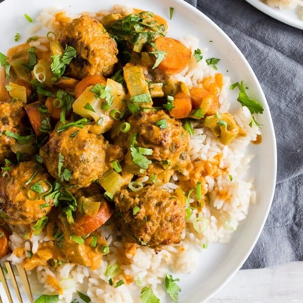 These red curry turkey meatballs are packed full of flavor and come together in no time for a quick weeknight meal. You can even make the meatballs in advance to make the meal come together even quicker! 