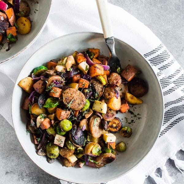 This chicken sausage fall vegetable hash is PACKED full of seasonal vegetables and apple chicken sausage. You'll love how easy this dish comes together and can be customized to include almost any vegetable you have in the house. Hearty, delicious and perfect for fall. 