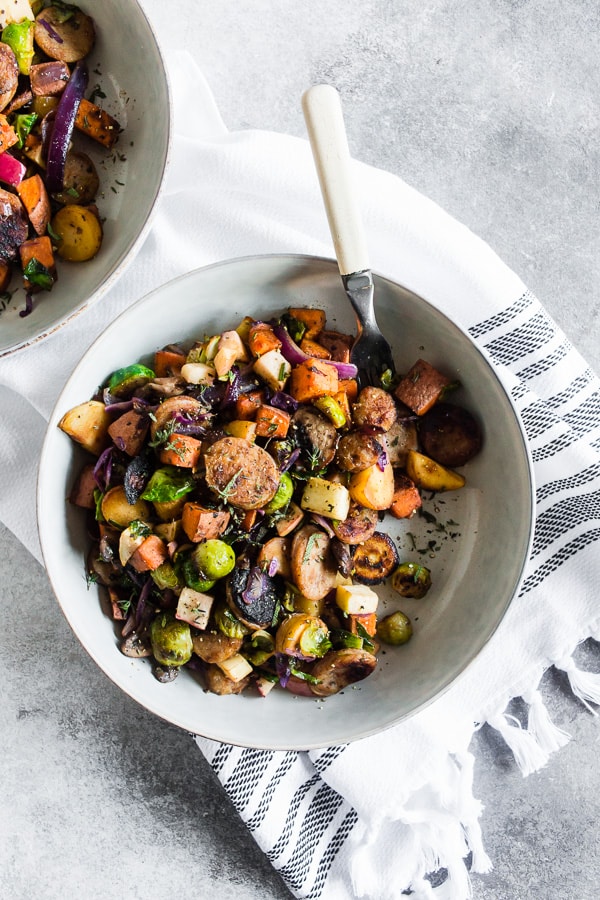 Chicken Sausage Vegetable Hash in a bowl with a fork. 