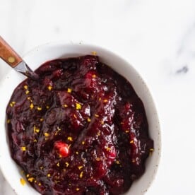 This super simple ginger laced cranberry orange sauce is perfect for Thanksgiving, Christmas or everyday eating. Made with fresh cranberries, orange juice and just a touch of brown sugar. You'll never need to buy canned again!