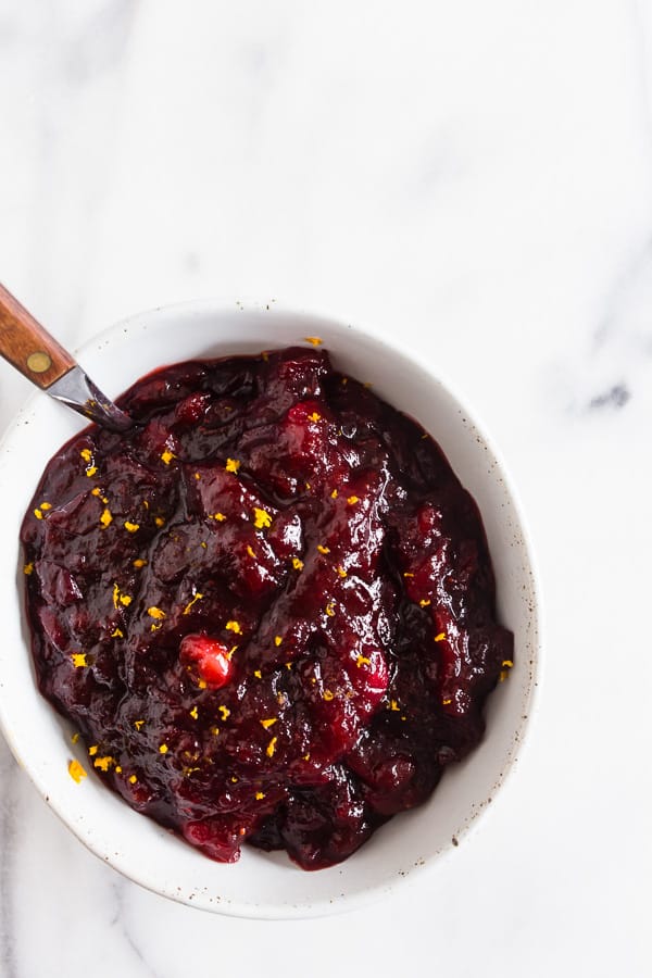 Cranberry Orange Sauce with Ginger in a white bowl. 
