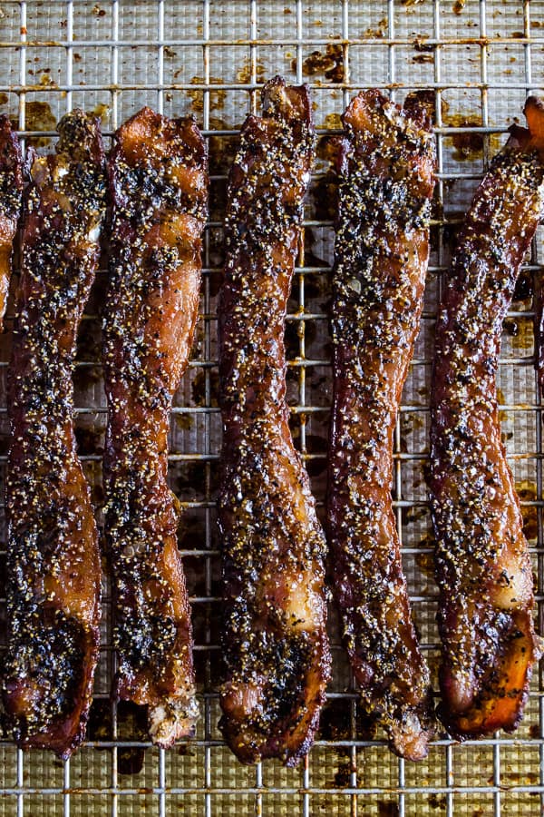 Maple Black Pepper Bacon fully cooked on a sheet pan.
