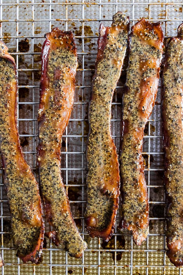 Maple Black Pepper Bacon slathered in dressing waiting to be cooked.