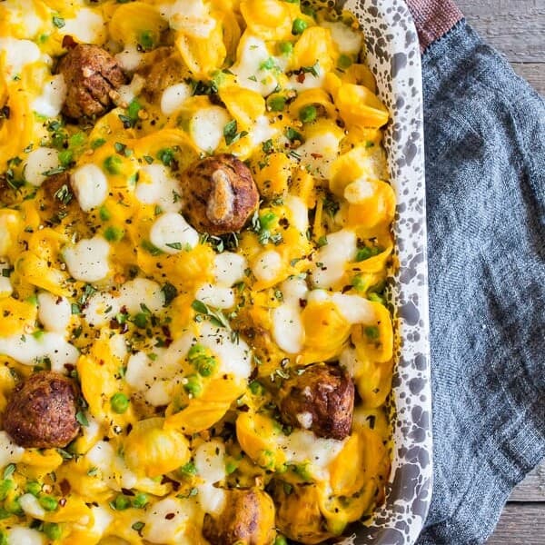 This pumpkin cauliflower alfredo meatball pasta bake is ready in under 30 minutes and packed full of delicious flavor. It's the perfect fall dish and you'll love how easy it is to throw together!