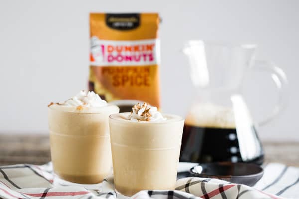 Pumpkin Spice Coffee Protein Shake with a pot of iced coffee. 