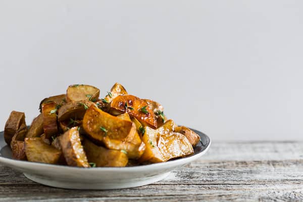 Roasted White Sweet Potatoes served on a serving plate. 