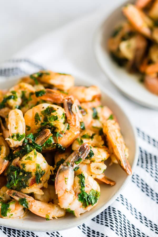 Spicy Garlic Cilantro Shrimp served with garlic and cilantro.