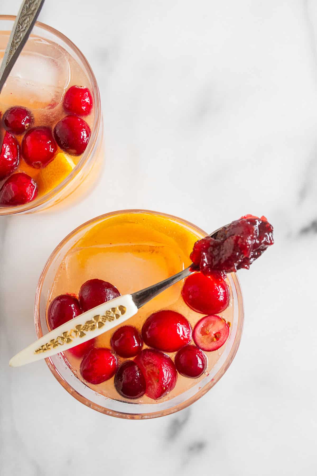 Cranberry Gin Fizz served in a cocktail glass. 