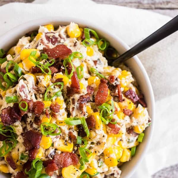 This creamy bacon jalapeno corn dip is packed full of flavor, ready in 20 minutes and perfect for any holiday party. I added lots of extra crispy bacon and tons of spicy jalapenos. You'll love this quick and easy appetizer!