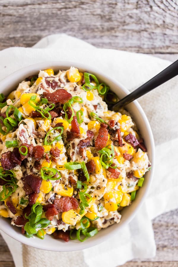 This creamy bacon jalapeno corn dip is packed full of flavor, ready in 20 minutes and perfect for any holiday party. I added lots of extra crispy bacon and tons of spicy jalapenos. You'll love this quick and easy appetizer!