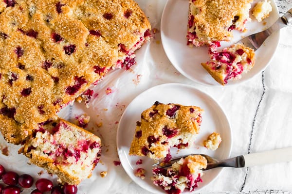 Vanilla Cranberry Buttermilk Cake served on a white plate.