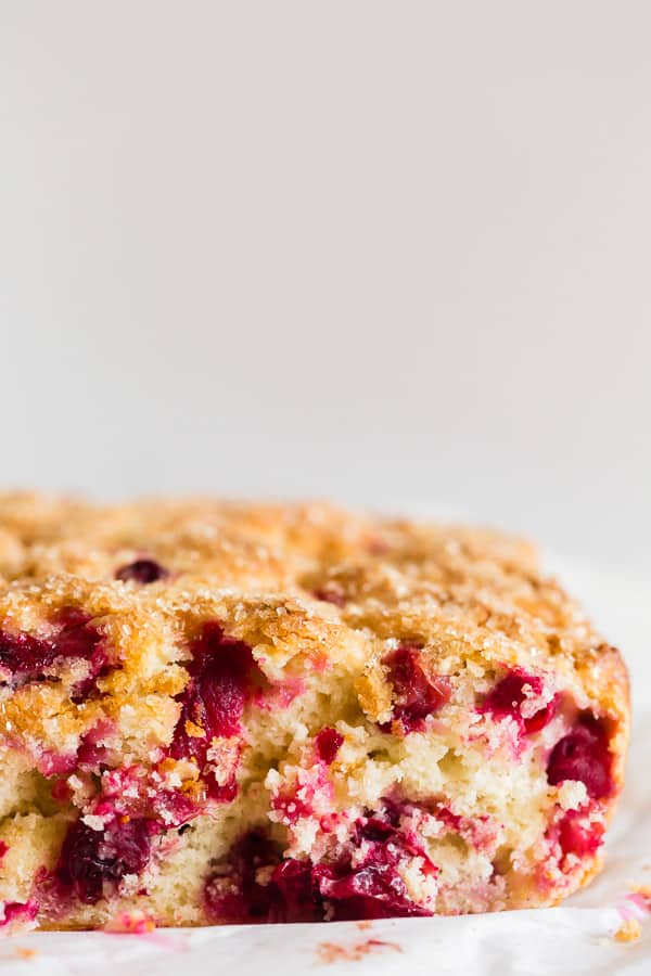 Vanilla Cranberry Buttermilk Cake cut to show filling.