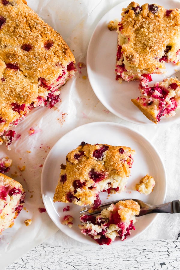 Vanilla Cranberry Buttermilk Cake served on dessert plates.