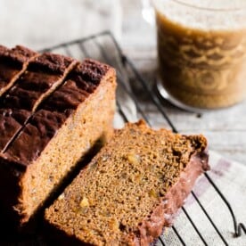 This gingerbread banana bread is the perfect combination of warm winter spices and sweet banana flavor. It's packed with candied ginger, freshly grated ginger and just a touch of molasses. You'll love how easy it is to make this flavorful quick bread!