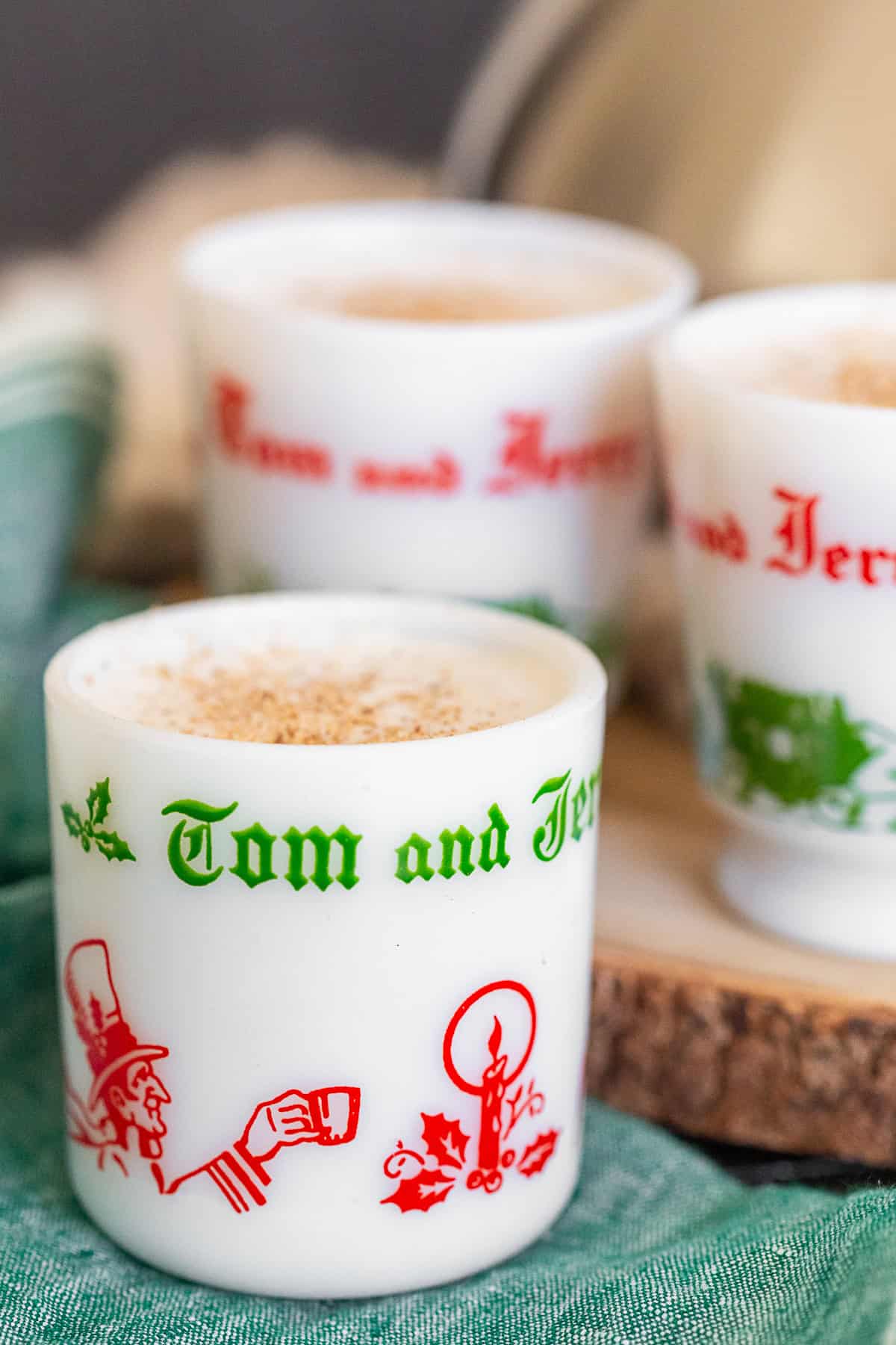 Tom and Jerry Cocktail Recipe in mugs.