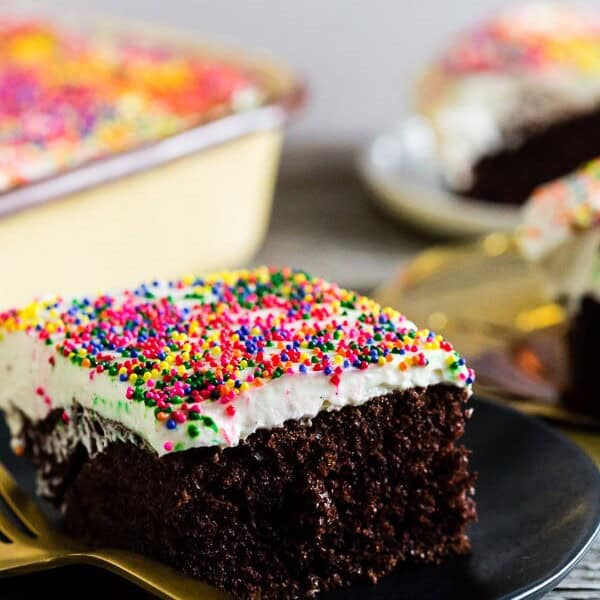 This fluffy cream cheese frosting is the BEST! It's light, not too sweet and has hints of vanilla bean and almond. It's a great all around frosting that will work on everything from cupcakes to cookies. If light fluffy frosting is your thing this recipe is for you! 