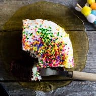 This fluffy cream cheese frosting has just a hint of sweetness and flavored with almond and vanilla bean. You’ll love this simple frosting!