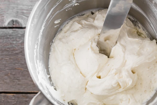 fluffy cream cheese frosting in a mixing bowl