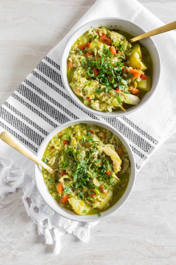 Peruvian Chicken Soup (Aguadito de Pollo) in a ceramic bowl.