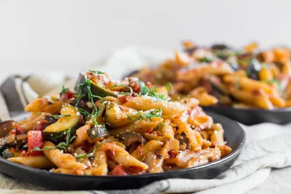 Ratatouille Pasta on a plate with basil. 