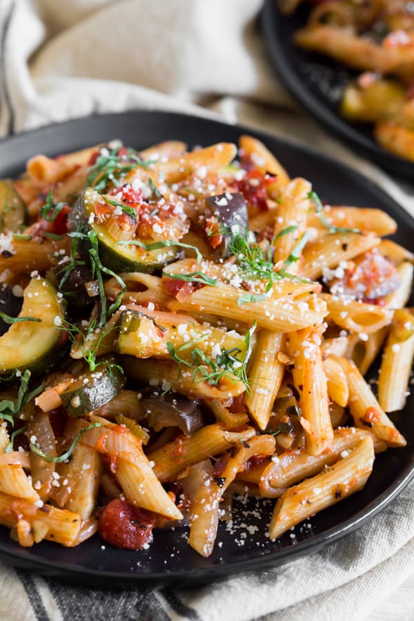 Ratatouille Pasta garnished with basil. 