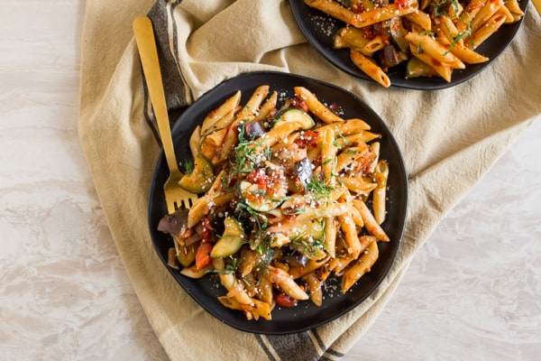 Ratatouille Pasta on a plate with a fork. 