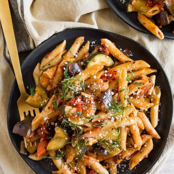 This ratatouille pasta is packed full of eggplant, zucchini, fennel, onion, and tomatoes. It's simple to make and ready in no time! Trust me, you'll love this simple meatless pasta recipe. 