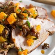 This roast pork loin with dried fruit compote is an easy and flavorful dinner recipe that your whole family will love. Serve with rice, buttered noodles or even mashed potatoes. Juicy roast pork served with a homemade compote made out of golden raisins, dried apricots, dates, orange juice and just a touch of cilantro. So good!