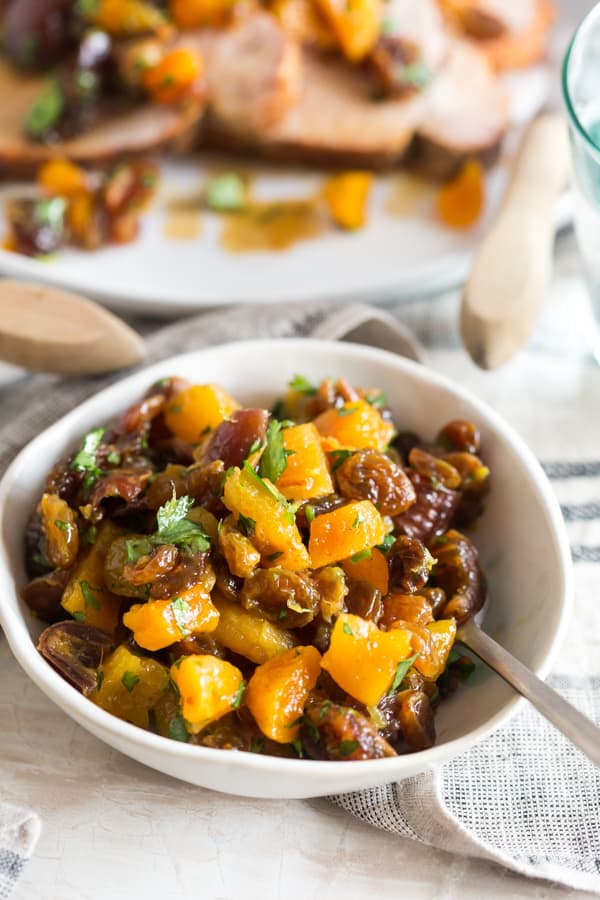 This roast pork loin with dried fruit compote is super flavorful and easy to make. Dried fruit compote in a bowl.