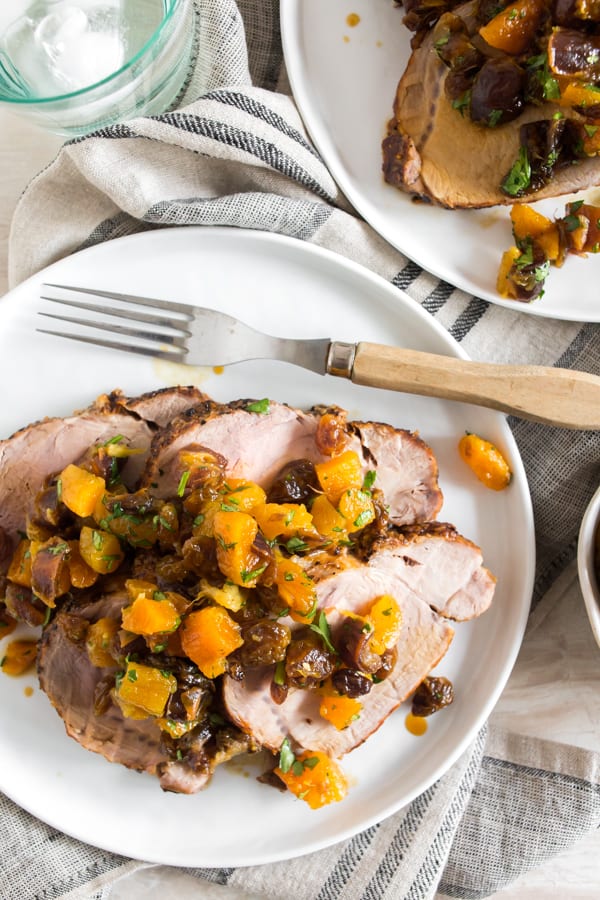 This roast pork loin with dried fruit compote is an easy and flavorful dinner recipe packed full of dates, golden raisins and dried apricots. Roast pork loin topped with fruit compote.