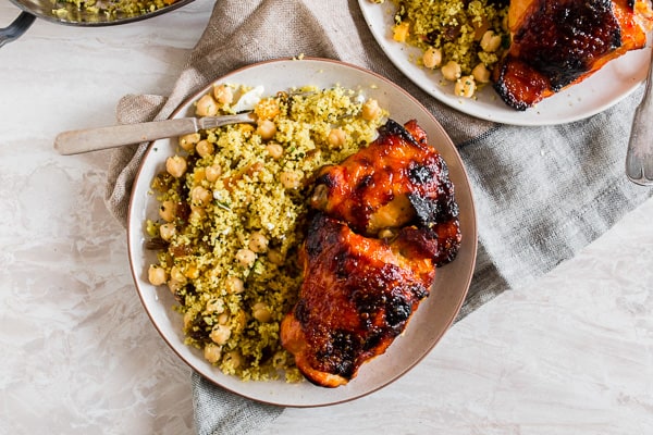 Harissa Chicken Thighs on a white plate. 
