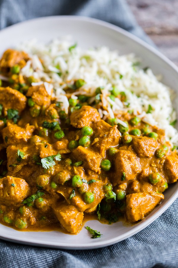 Instant Pot Chicken Tikka Masala on a plate with rice.