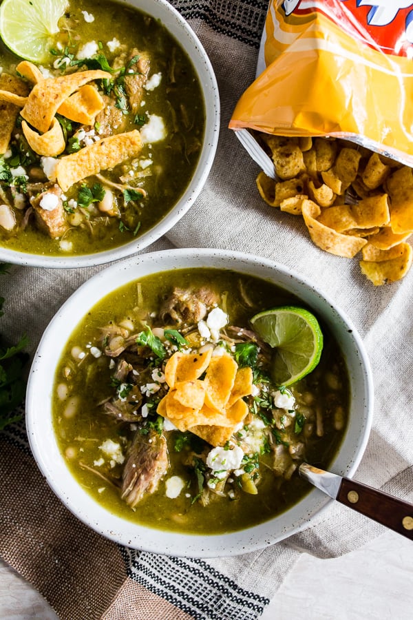 Instant Pot Pork Chili Verde topped with corn chips.