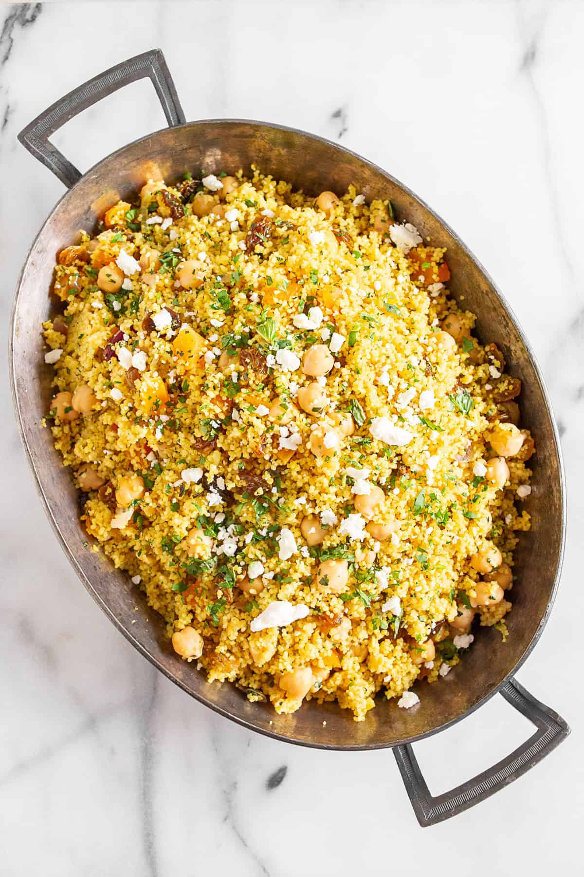 Moroccan Couscous in a metal baking dish. 