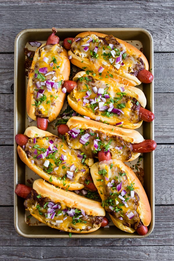 Oven Baked Chili Cheese Dogs on a small sheet pan.