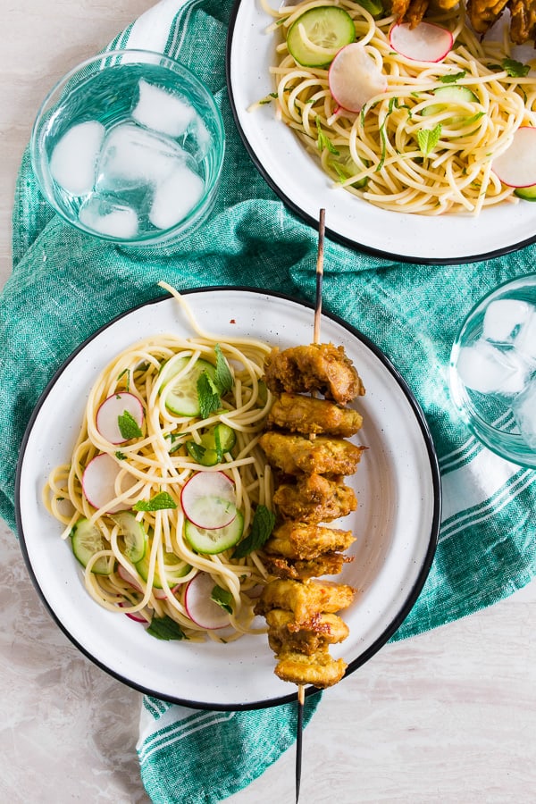 Chicken Satay Noodles served on a plate. 