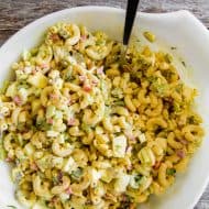 This classic macaroni salad is packed full of crunchy vegetables, hard-boiled eggs, and a homemade dressing made out of yellow mustard, mayonnaise, and pickle juice. It's the perfect old fashioned Easter side dish or a delicious summertime cookout addition.