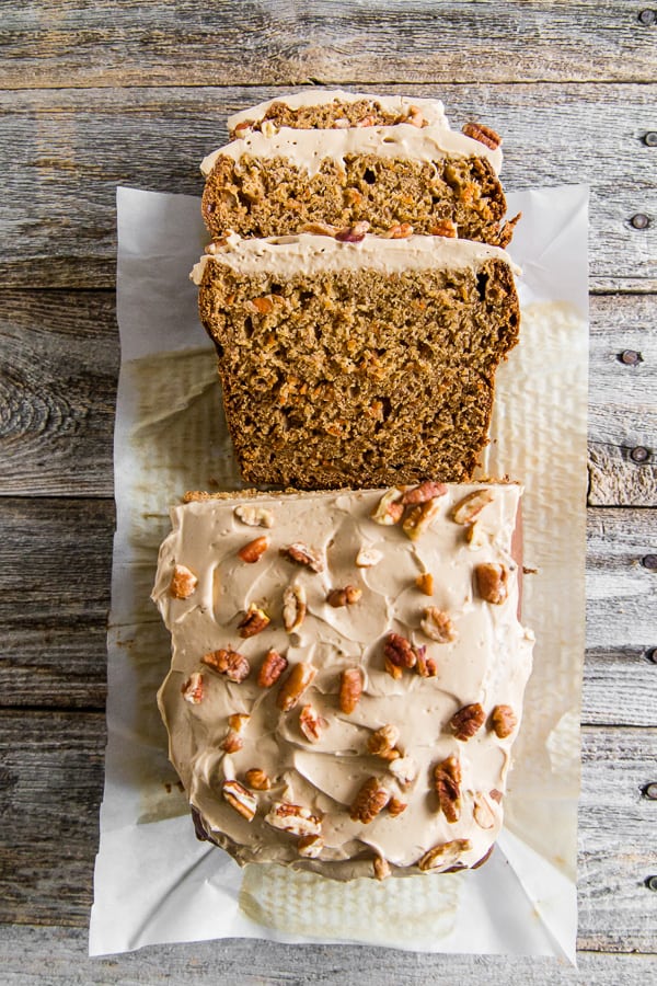 This carrot cake banana bread is topped with a creamy maple cream cheese frosting and the perfect use for ripe bananas. It's a flavorful twist to a classic quick bread that you're sure to love.