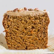 This carrot cake banana bread is topped with a creamy maple cream cheese frosting and the perfect use for ripe bananas. It's a flavorful twist to a classic quick bread that you're sure to love.