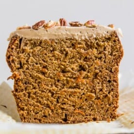 This carrot cake banana bread is topped with a creamy maple cream cheese frosting and the perfect use for ripe bananas. It's a flavorful twist to a classic quick bread that you're sure to love.