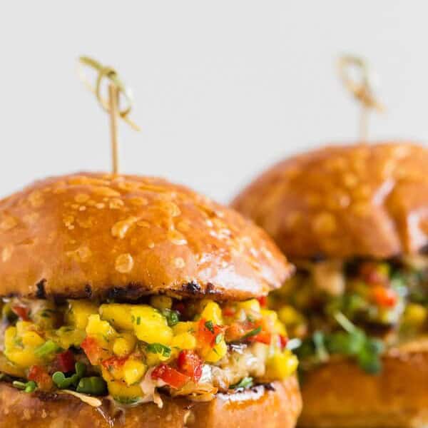 These chipotle chicken burgers are topped with fiery pepper jack cheese and fresh homemade mango salsa. Trust me, this burger is packed full of flavor and the perfect addition to your summer BBQ. 