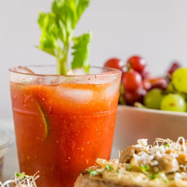 This horseradish bloody mary is slightly spicy, packed full of flavor and the perfect addition to any party or this tasty hummus toast brunch spread. Plus it's ready in just 5 minutes so it's the perfect party cocktail!