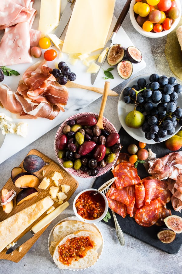Ultimate Italian Antipasto Platter laid out on a white marble board