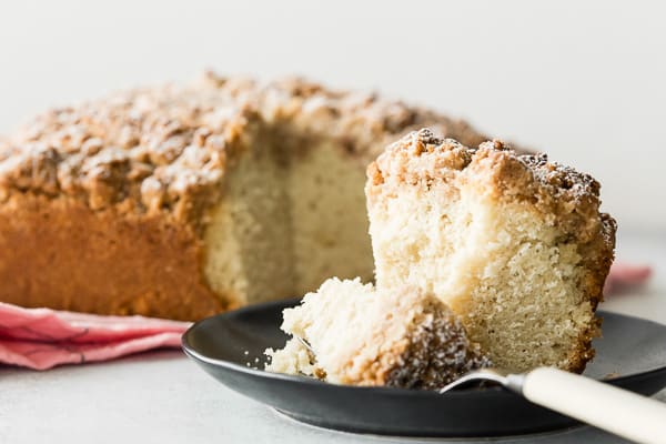 sourdough coffee cake cake sliced with a bite sitting on a fork