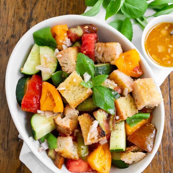grilled sourdough panzanella salad with tomato water dressing